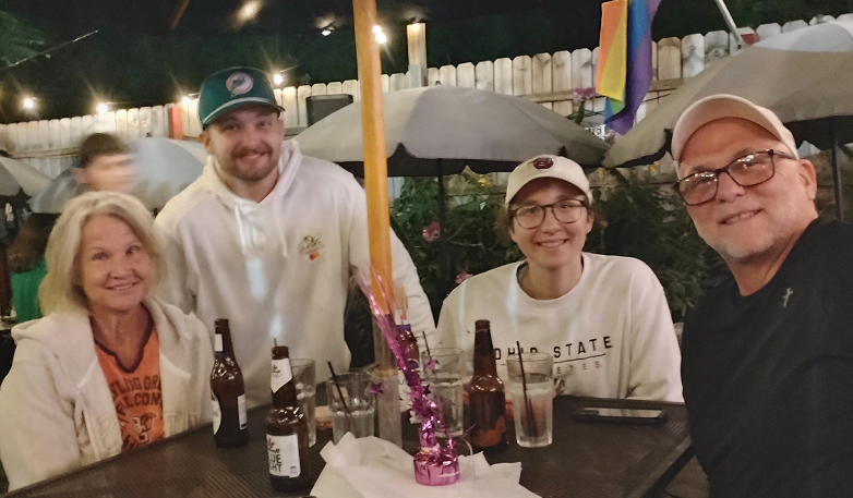 Guests seated together on the Casey's patio on a Friday night.