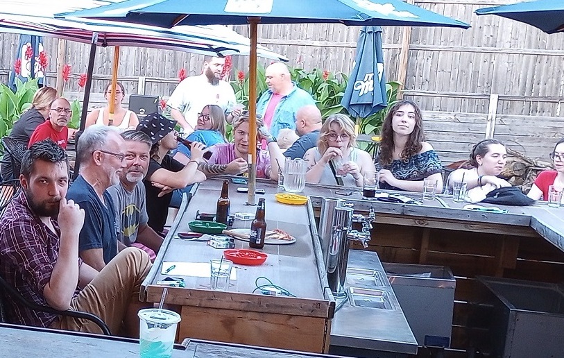 Friends enjoying happy hour at Casey’s near the University of Toledo