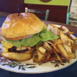Hand-formed burger with house fries at Casey’s Toledo