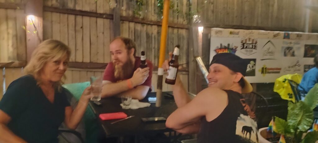 Friends playing Name That Tune on the patio at Casey's in West Toledo.